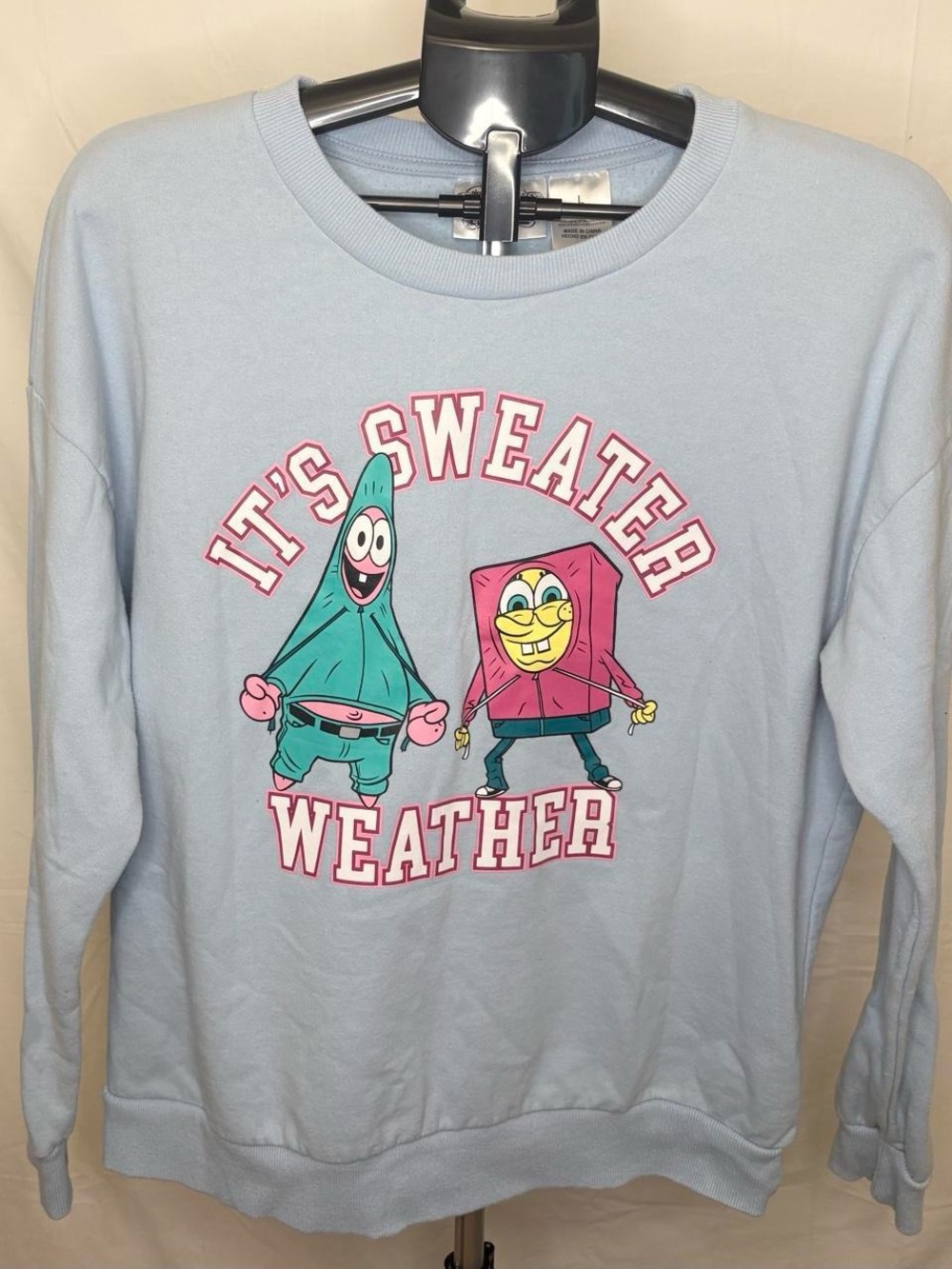 SpongeBob Squarepants Light Blue Crewneck Sweatshirt with Cartoon Graphic